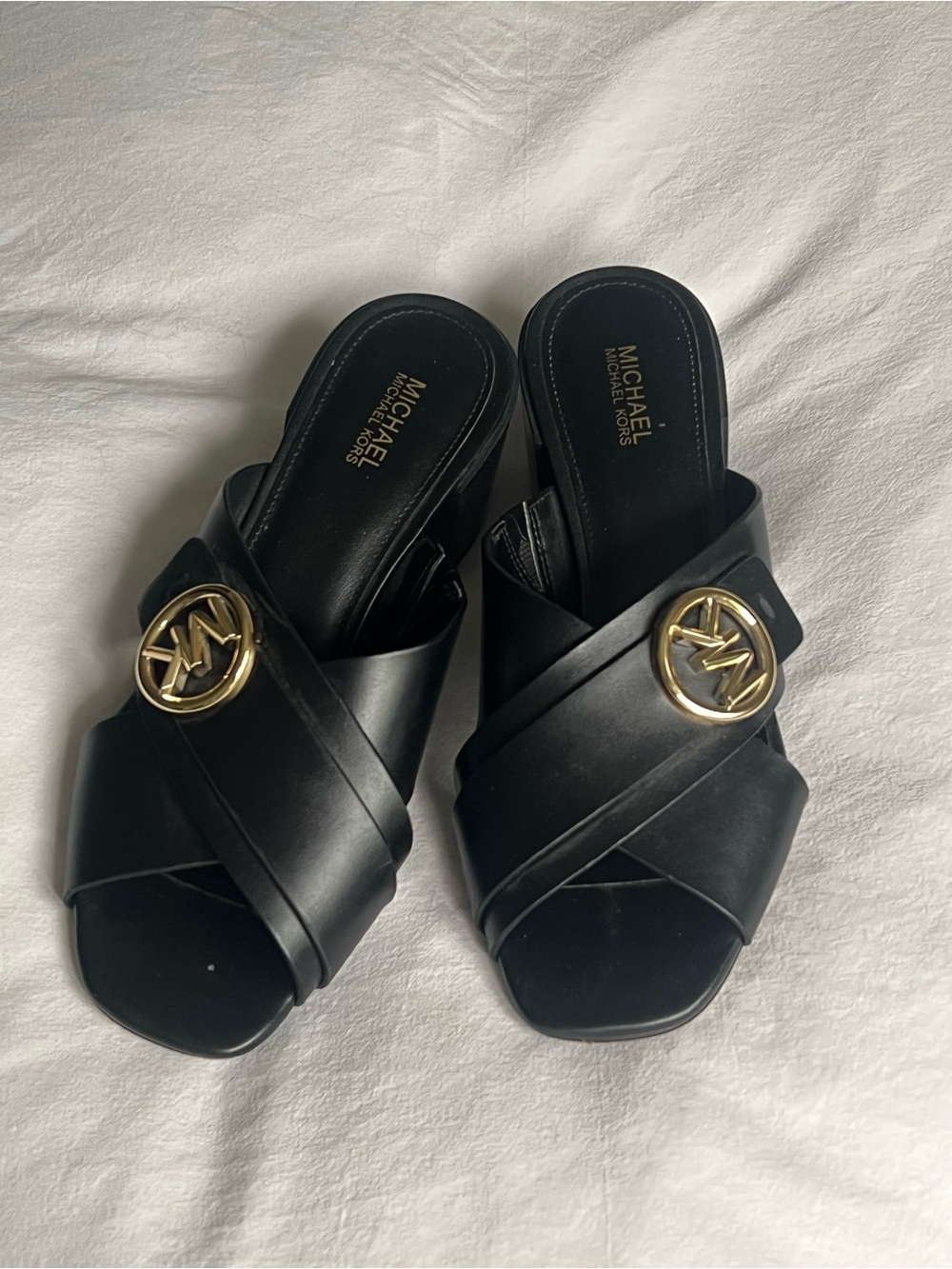 Michael Kors Black Leather Slide Mules with Gold Logo Medallions